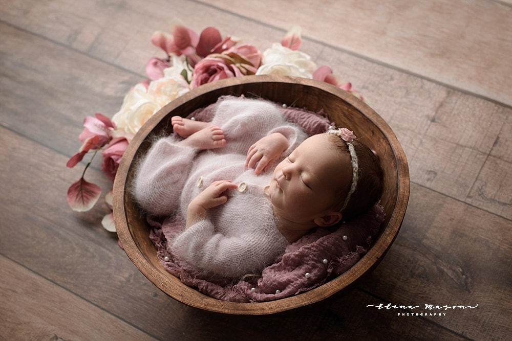 newborn baby girl in bucket with flowers, Belfast baby photographer, Elena Mason Photography