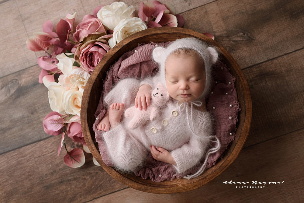 newborn baby girl in bucket with flowers and teddy bear, Belfast baby photographer, Elena Mason Photography