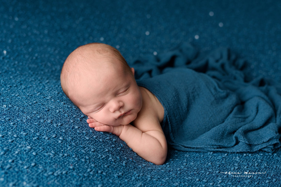 sleeping baby on blue, newborn photo session, newborn photography Belfast